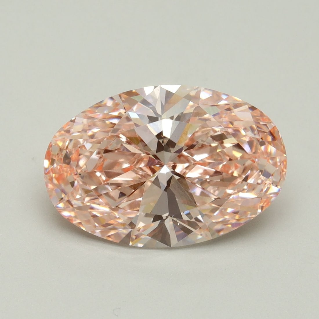 Loose Diamond - OVAL 5.06ct Fancy Vivid Pink VS1: Loose Diamond - OVAL 5.06ct Fancy Vivid Pink VS1 Source: This is a real non-mined Diamond that has been grown in a lab Shape: OVAL Carats: 5.06 Color: Fancy Vivid Pink Certification: IGI Video: