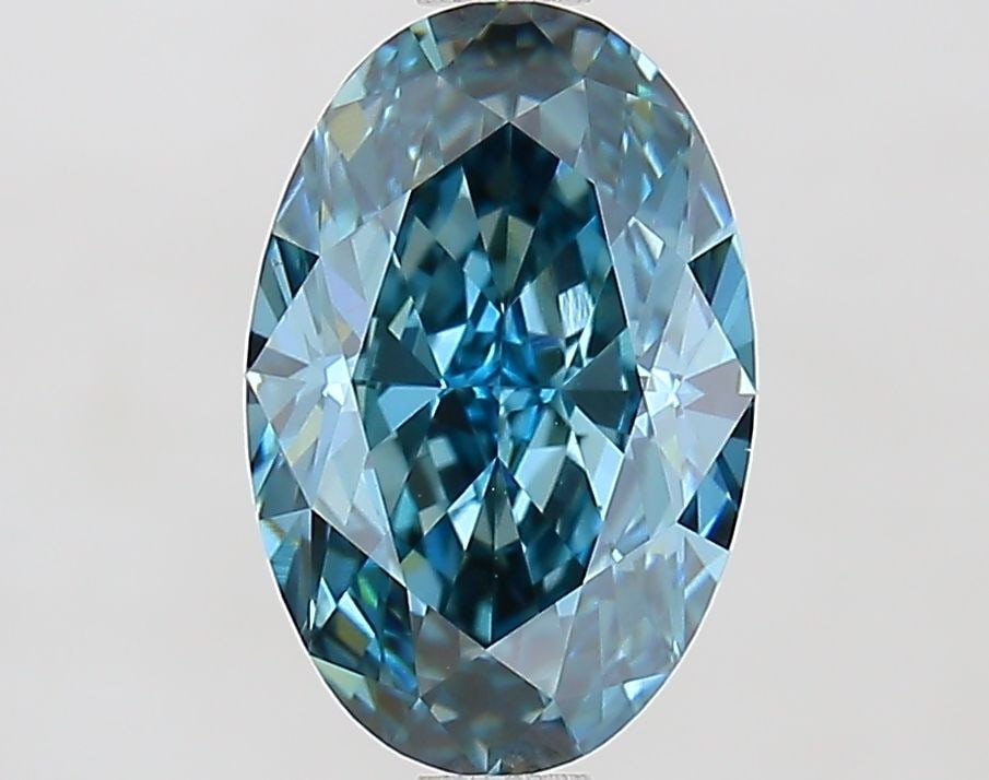 Loose Diamond - OVAL 2.1ct Fancy Vivid Greenish Blue VVS2: Loose Diamond - OVAL 2.1ct Fancy Vivid Greenish Blue VVS2 Source: This is a real non-mined Diamond that has been grown in a lab Shape: OVAL Carats: 2.1 Color: Fancy Vivid Greenish Blue Certification: 