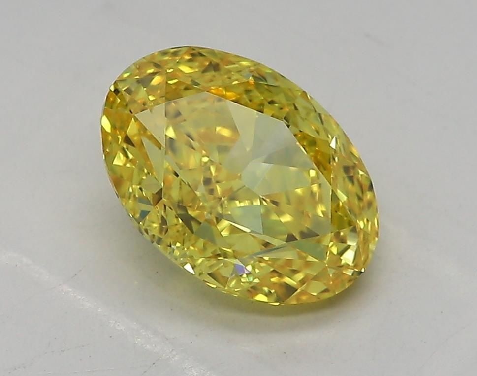 Loose Diamond - OVAL 1.52ct Fancy Vivid Yellow VVS1: Loose Diamond - OVAL 1.52ct Fancy Vivid Yellow VVS1 Source: This is a real non-mined Diamond that has been grown in a lab Shape: OVAL Carats: 1.52 Color: Fancy Vivid Yellow Certification: IGI Video: