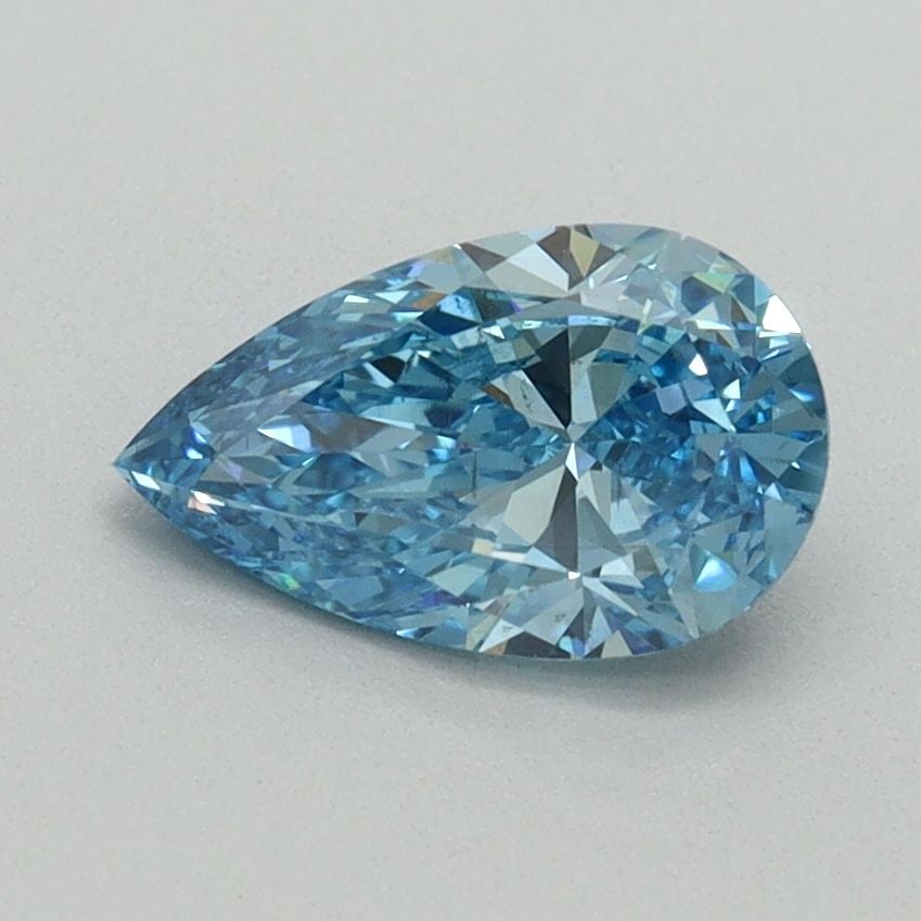 Loose Diamond - PEAR 1.01ct Fancy Vivid Blue VS2: Loose Diamond - PEAR 1.01ct Fancy Vivid Blue VS2 Source: This is a real non-mined Diamond that has been grown in a lab Shape: PEAR Carats: 1.01 Color: Fancy Vivid Blue Certification: IGI Video: