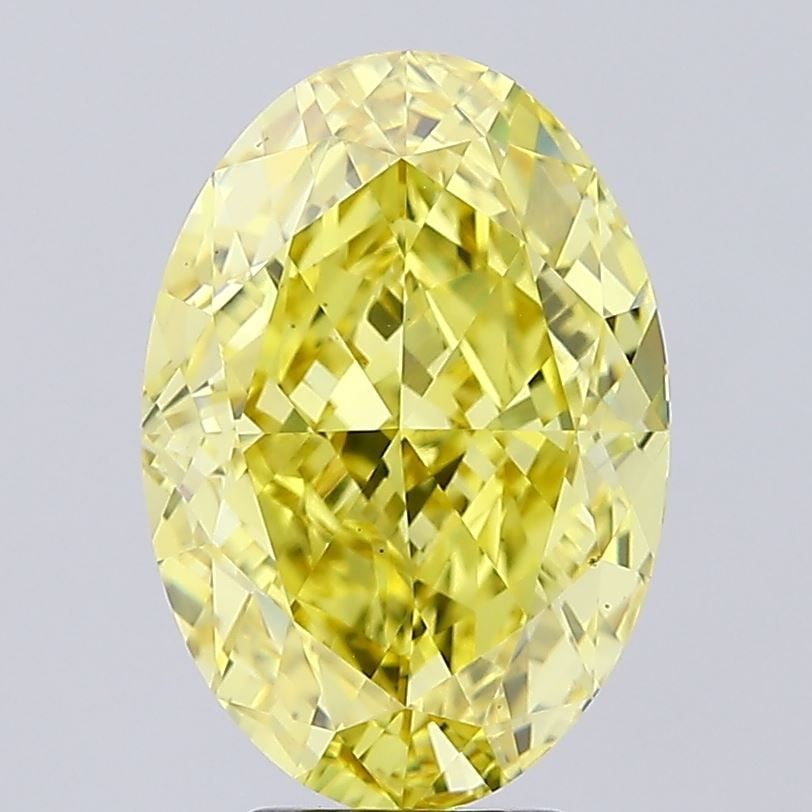 Loose Diamond - OVAL 6.5ct Fancy Vivid Yellow VS1: Loose Diamond - OVAL 6.5ct Fancy Vivid Yellow VS1 Source: This is a real non-mined Diamond that has been grown in a lab Shape: OVAL Carats: 6.5 Color: Fancy Vivid Yellow Certification: IGI Video: