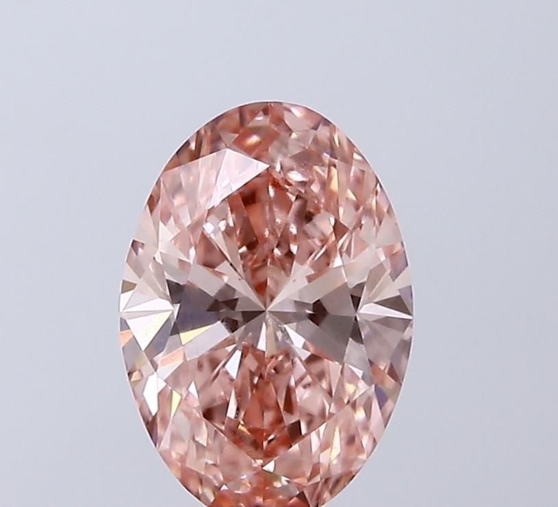 Loose Diamond - OVAL 1.5ct Fancy Vivid Pink VVS2: Loose Diamond - OVAL 1.5ct Fancy Vivid Pink VVS2 Source: This is a real non-mined Diamond that has been grown in a lab Shape: OVAL Carats: 1.5 Color: Fancy Vivid Pink Certification: IGI Video: