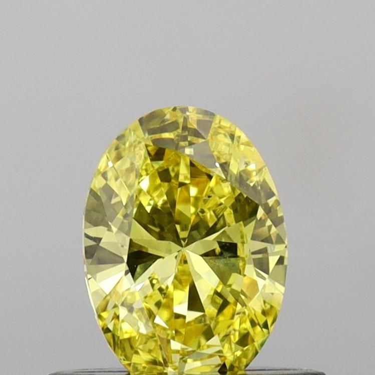 Loose Diamond - OVAL 0.47ct Fancy Vivid Yellow VS2: Loose Diamond - OVAL 0.47ct Fancy Vivid Yellow VS2 Source: This is a real non-mined Diamond that has been grown in a lab Shape: OVAL Carats: 0.47 Color: Fancy Vivid Yellow Certification: IGI Video: