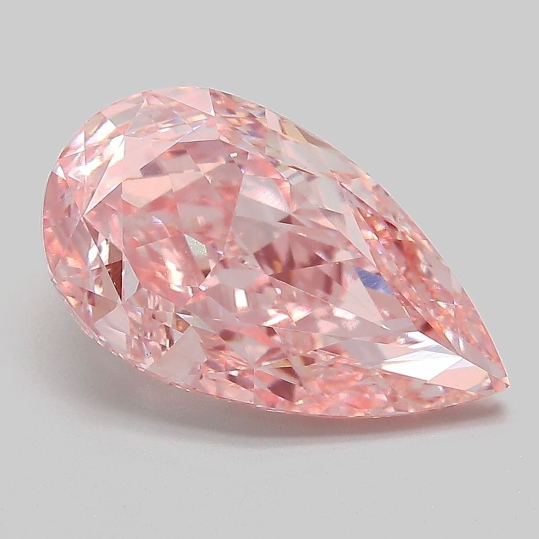 Loose Diamond - PEAR 4.65ct Fancy Vivid Pink VS1: Loose Diamond - PEAR 4.65ct Fancy Vivid Pink VS1 Source: This is a real non-mined Diamond that has been grown in a lab Shape: PEAR Carats: 4.65 Color: Fancy Vivid Pink Certification: IGI Video: