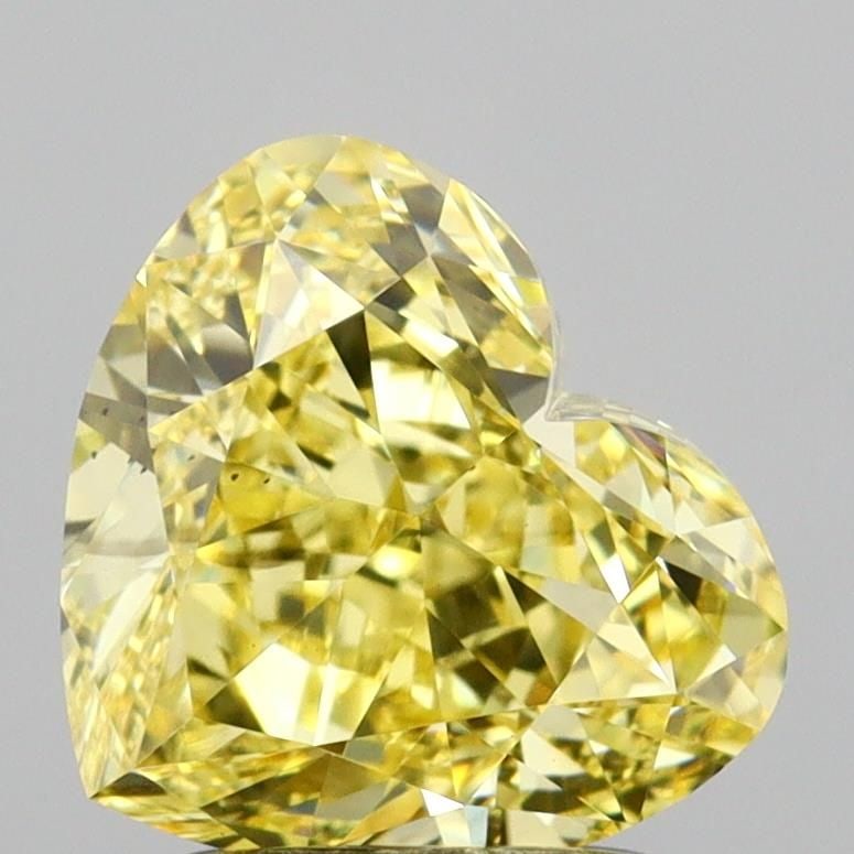 Loose Diamond - HEART 2.08ct Fancy Vivid Yellow VS2: Loose Diamond - HEART 2.08ct Fancy Vivid Yellow VS2 Source: This is a real non-mined Diamond that has been grown in a lab Shape: HEART Carats: 2.08 Color: Fancy Vivid Yellow Certification: IGI Video: