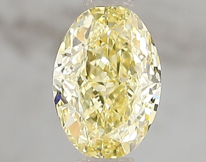 Loose Diamond - OVAL 1.1ct Fancy Vivid Yellow VVS2: Loose Diamond - OVAL 1.1ct Fancy Vivid Yellow VVS2 Source: This is a real non-mined Diamond that has been grown in a lab Shape: OVAL Carats: 1.1 Color: Fancy Vivid Yellow Certification: IGI Video: