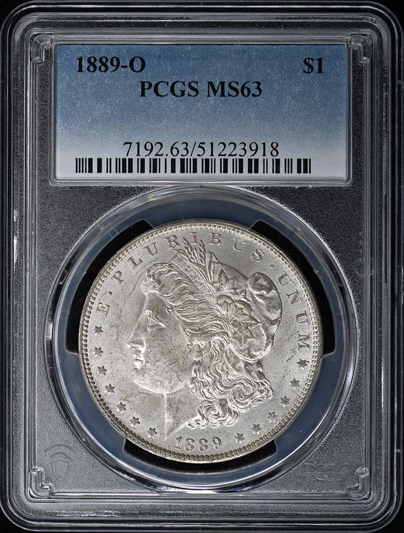 1889-O Morgan Dollar PCGS MS63 Uncirculated Coin: 1889-O Morgan Dollar PCGS MS63 Uncirculated Coin This 1889-O Morgan Dollar is certified by PCGS with a grade of MS63, indicating it is in uncirculated condition. Minted in New Orleans, this coin repre