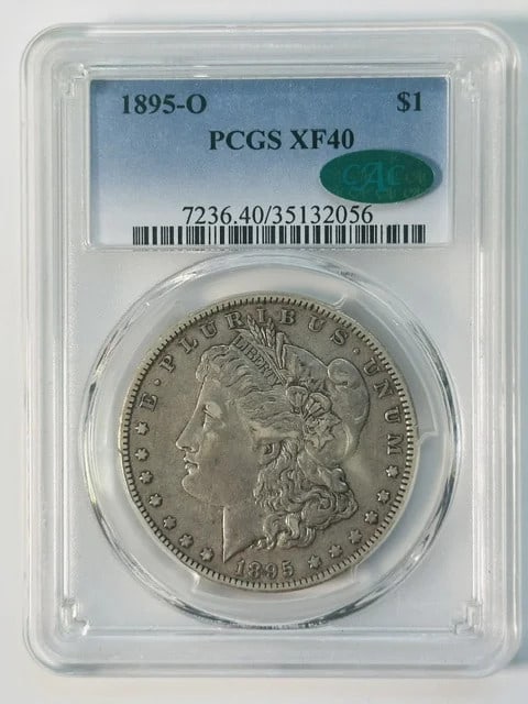 1895-O $1 Morgan Silver Dollar PCGS XF40 CAC Certified: 1895-O $1 Morgan Silver Dollar PCGS XF40 CAC Certified 1895-O Morgan Silver Dollar graded XF 40 by PCGS with CAC approval. The coin is composed of silver and has a dollar denomination. It was minted i