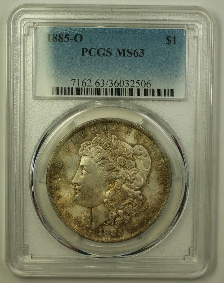 PCGS MS-63 1885-O Morgan Dollar Silver Coin Choice Toned Uncirculated: PCGS MS-63 1885-O Morgan Dollar Silver Coin Choice Toned Uncirculated This 1885-O Morgan Silver Dollar is a $1 coin minted in New Orleans. Certified by PCGS with a grade of MS 63, it features a brilli