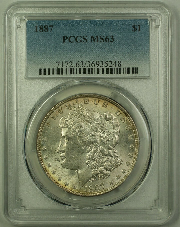 PCGS MS63 1887 Morgan Dollar Silver Coin Toned Reverse: PCGS MS63 1887 Morgan Dollar Silver Coin Toned Reverse This is an 1887 Morgan Silver Dollar $1 coin from the United States, minted in Philadelphia. It is composed of 90% silver and has been certified 