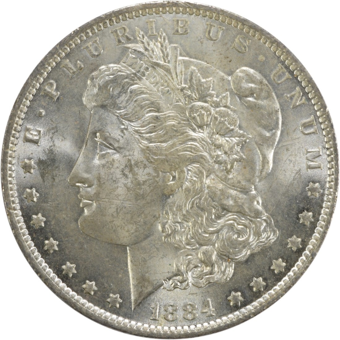 Choice BU 1884 O Silver Dollar Uncertified Morgan Coin: Choice BU 1884 O Silver Dollar Uncertified Morgan Coin This 1884-O Morgan Silver Dollar is an uncirculated coin graded as Choice Brilliant Uncirculated (BU). Minted in New Orleans, it is composed of s