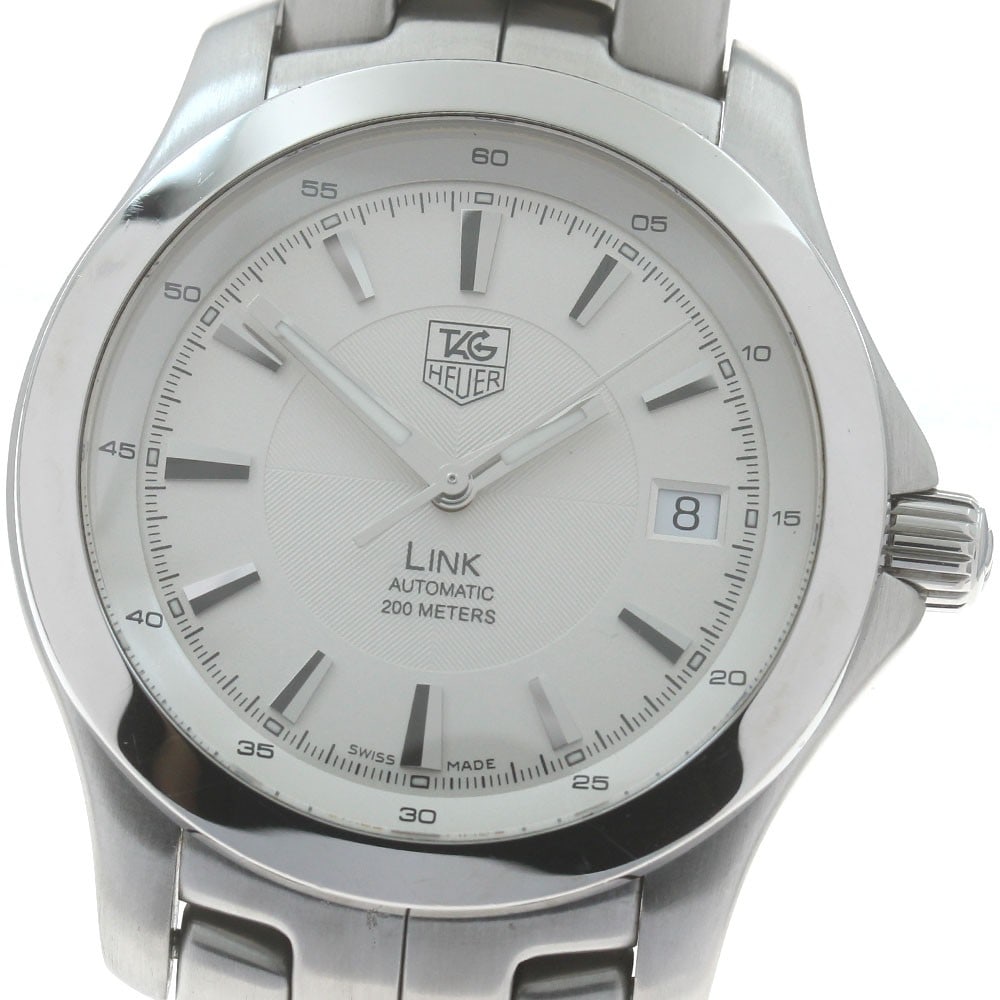 Tag Heuer Link Date Automatic Stainless Steel Men's Watch WJF2111: Tag Heuer Link Date Automatic Stainless Steel Men's Watch WJF2111 This TAG Heuer Link Date men's wristwatch features a stainless steel case and band, complemented by a silver dial. The watch operates 