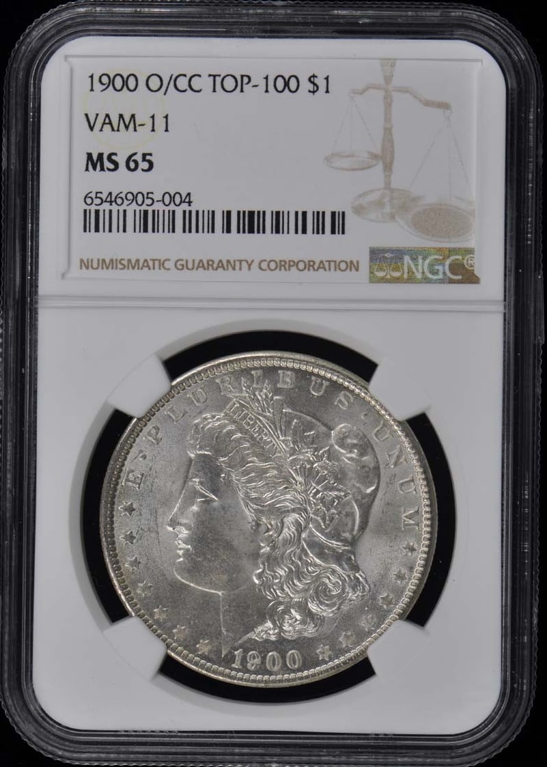 1900-O/CC Morgan Dollar NGC MS65 Uncirculated Silver Coin: 1900-O/CC Morgan Dollar NGC MS65 Uncirculated Silver Coin This stunning 1900-O/CC TOP-100 Morgan Dollar is graded MS65 by NGC, showcasing its uncirculated condition. With a rich history, this coin was