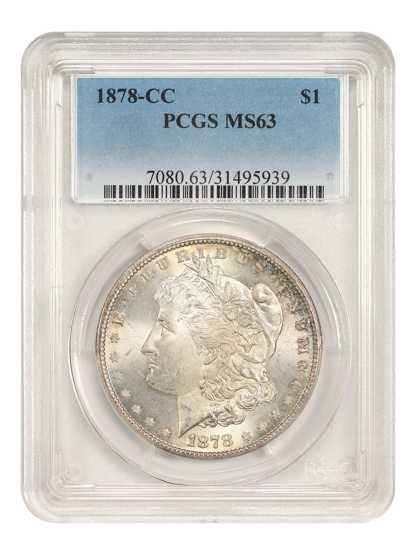 PCGS MS63 1878-CC Morgan Dollar Carson City First Year Issue: PCGS MS63 1878-CC Morgan Dollar Carson City First Year Issue 1878-CC Morgan Dollar certified by PCGS and graded MS63. This uncirculated $1 coin is from the Carson City Mint and is part of the Morgan D