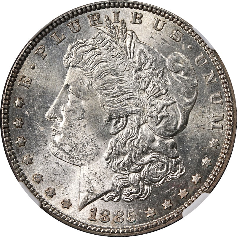 NGC MS63 1885 Philadelphia Morgan Dollar With Reverse Toning: NGC MS63 1885 Philadelphia Morgan Dollar With Reverse Toning This 1885-P Morgan Silver Dollar is certified by NGC with a grade of MS63 and features a few spots of toning on the reverse. It is composed