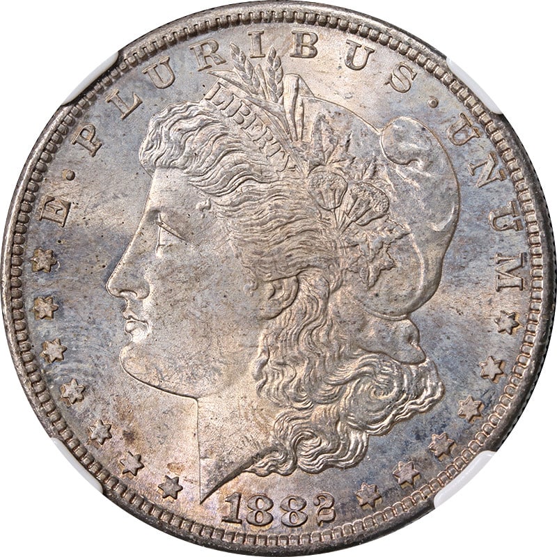 NGC MS65 1882-S Morgan Dollar United States Silver Coin with Toning: NGC MS65 1882-S Morgan Dollar United States Silver Coin with Toning This 1882-S Morgan Silver Dollar is graded MS65 by NGC. The coin is composed of silver with a fineness of 0.9, features attractive t