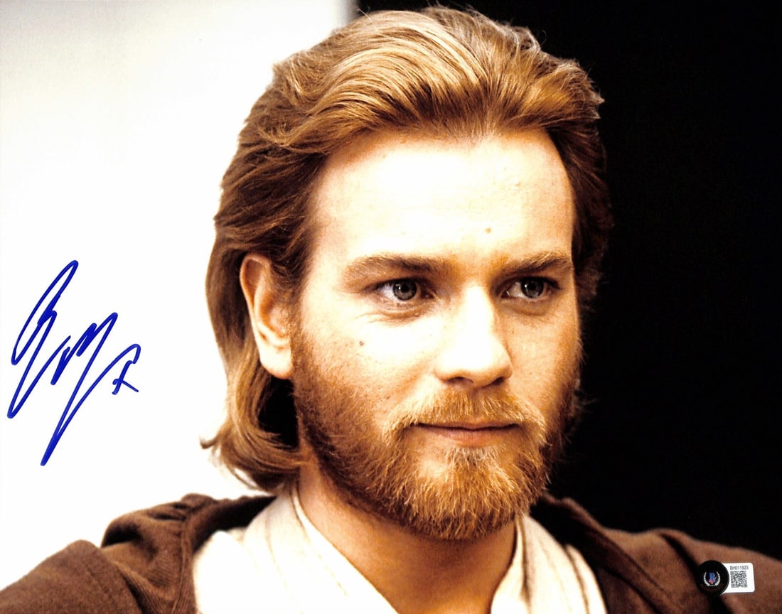 Autographed 11x14 Photo Ewan McGregor as Obi-Wan Kenobi Beckett Certified: Autographed 11x14 Photo Ewan McGregor as Obi-Wan Kenobi Beckett Certified This 11x14 photograph features Ewan McGregor as Obi-Wan Kenobi in Star Wars: The Phantom Menace. The photo has been hand-signe