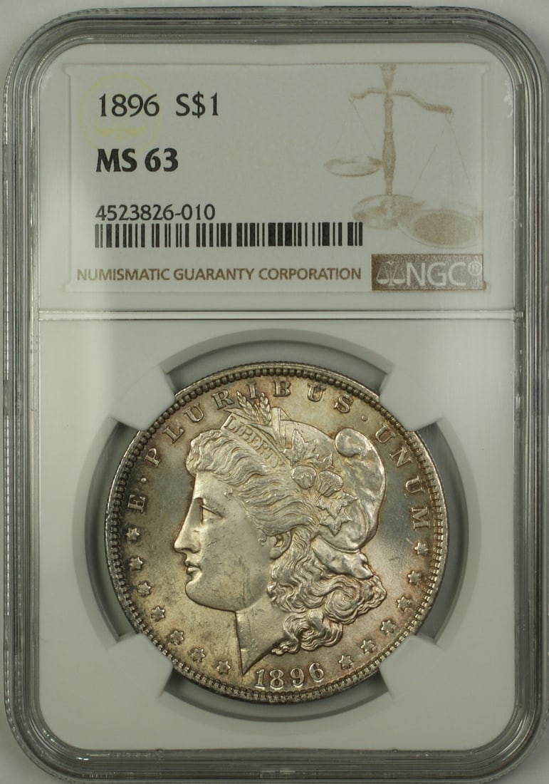 NGC MS-63 1896 Morgan Dollar Toned Silver $1: NGC MS-63 1896 Morgan Dollar Toned Silver $1 This 1896 Morgan Silver Dollar is an uncirculated coin graded MS-63 by NGC. Struck in Philadelphia, it is composed of 90% silver and features attractive to