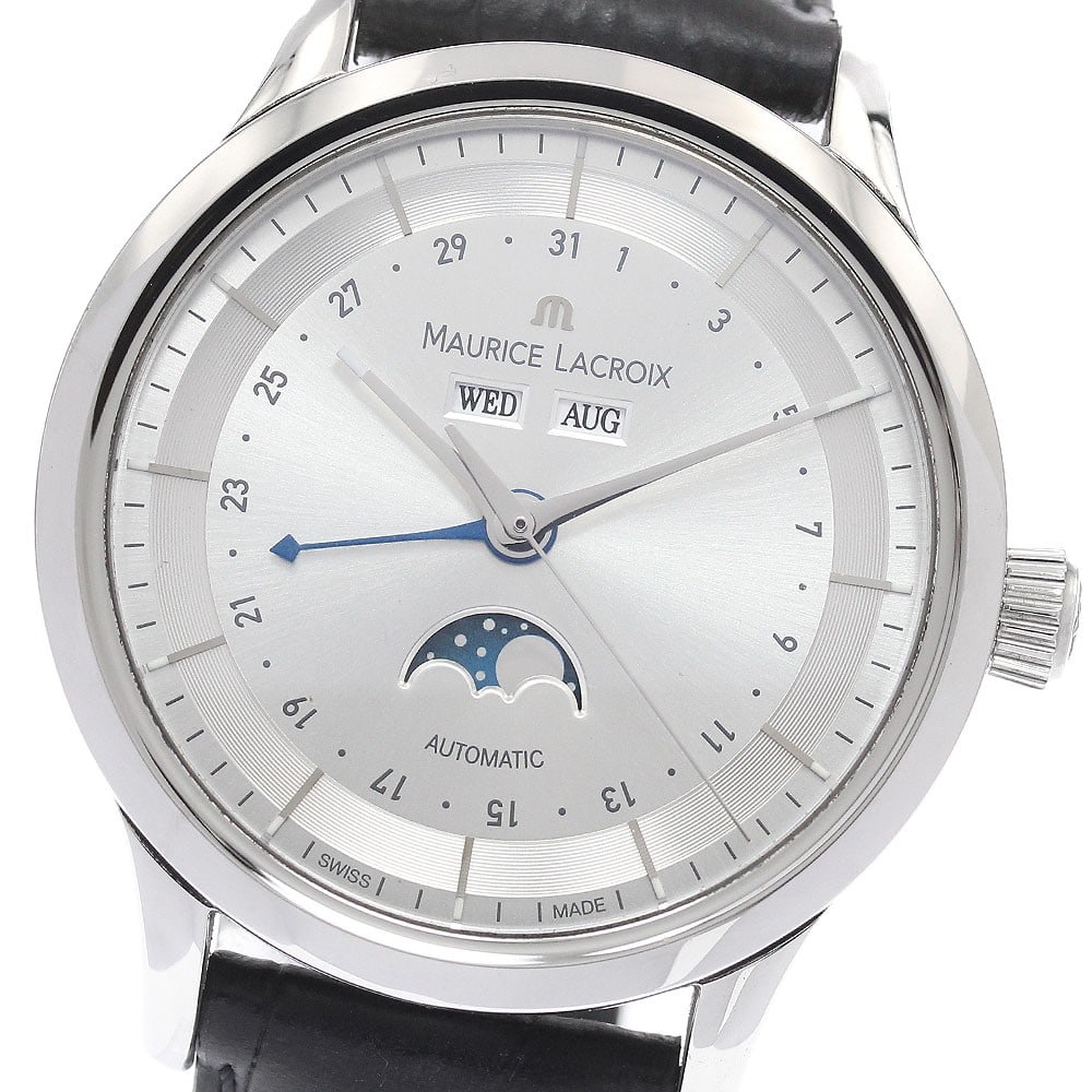 Maurice Lacroix Le Classic Moon Phase Mens Wristwatch LC6068-SS001-13E: Maurice Lacroix Le Classic Moon Phase Mens Wristwatch LC6068-SS001-13E Maurice Lacroix Le Classic Moon Phase men's wristwatch, model LC6068-SS001-13E. This pre-owned Swiss-made watch is presented as a