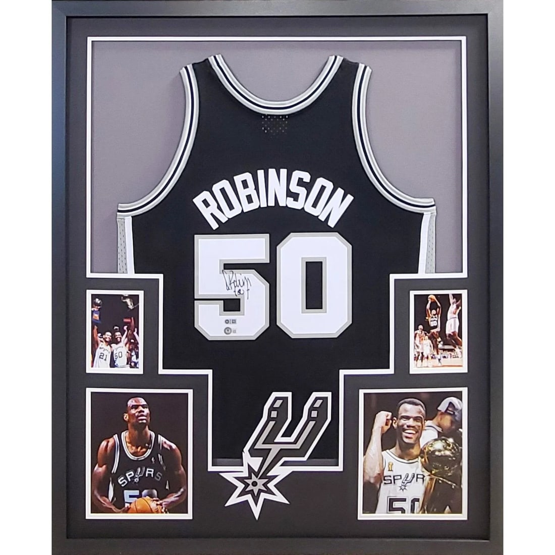 David Robinson Autographed Framed Jersey Beckett Certified Spurs 42x34: David Robinson Autographed Framed Jersey Beckett Certified Spurs 42x34 This is an autographed framed jersey of David Robinson, celebrating his legacy with the San Antonio Spurs. The jersey is authenti