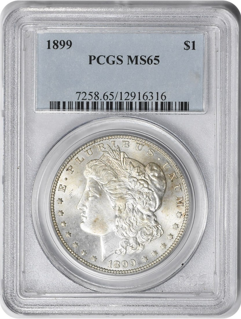 1899 Morgan Silver Dollar MS65 Uncirculated PCGS Certified: 1899 Morgan Silver Dollar MS65 Uncirculated PCGS Certified This stunning 1899 Morgan Silver Dollar, graded MS65 by PCGS, showcases the exceptional craftsmanship of its time. With a composition of 90% 