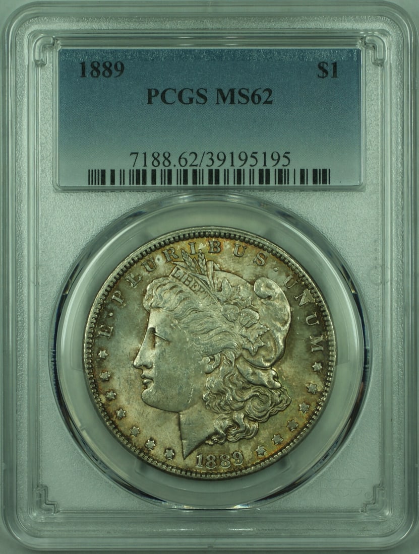 PCGS MS-62 1889 Morgan Silver Dollar: PCGS MS-62 1889 Morgan Silver Dollar This is an 1889 Morgan Silver Dollar graded MS-62 by PCGS. Struck in Philadelphia, this uncirculated coin is composed of 90% silver and has a denomination of $1. T
