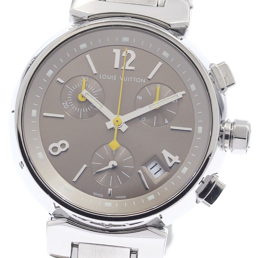 Louis Vuitton Tambour Q1322 quartz chronograph date wristwatch: Louis Vuitton Tambour Q1322 quartz chronograph date wristwatch This Louis Vuitton Tambour Q1322 is a pre-owned unisex wristwatch featuring a stainless steel case and bracelet with a brown dial. The wa