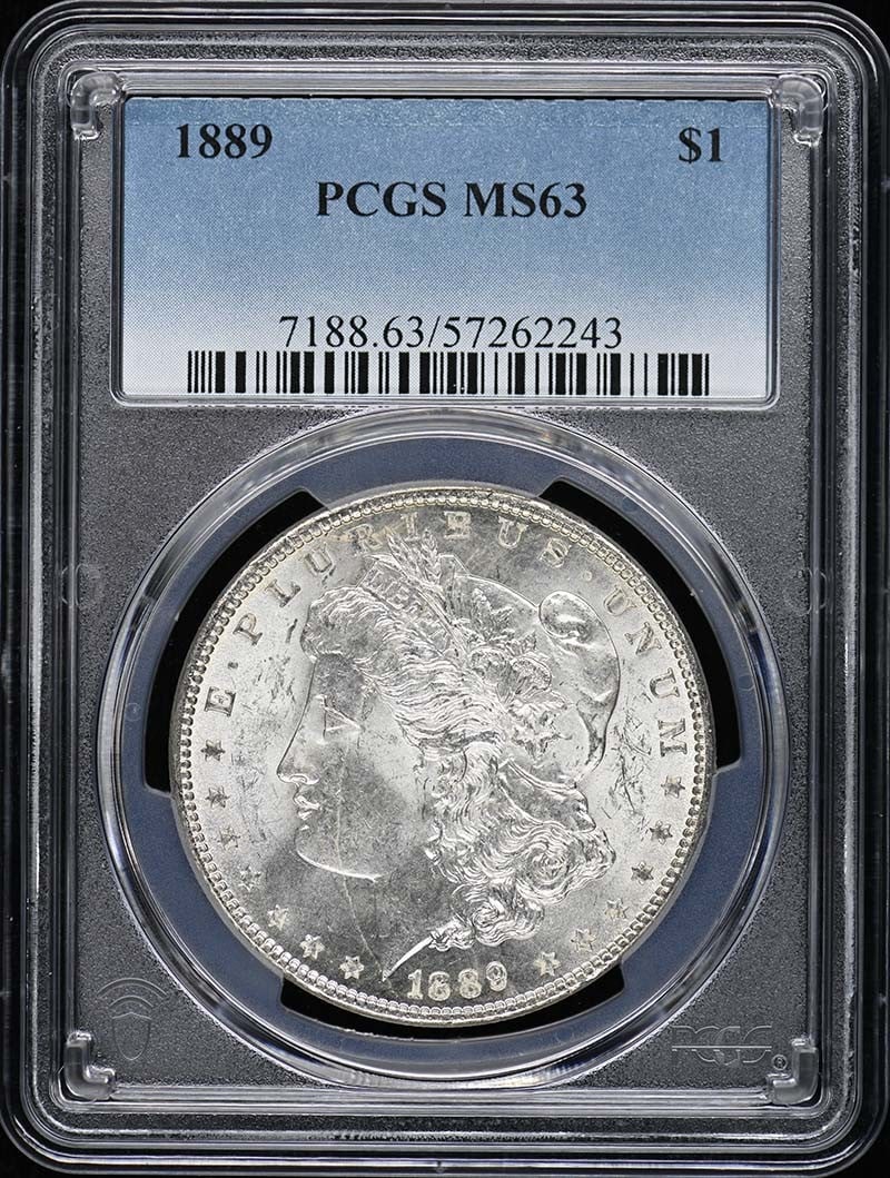 PCGS MS63 1889 Morgan Silver Dollar: PCGS MS63 1889 Morgan Silver Dollar This 1889 Morgan Dollar is graded MS63 by PCGS and is uncirculated. Minted in Philadelphia, it features the classic Morgan Dollar design and comes with PCGS certifi