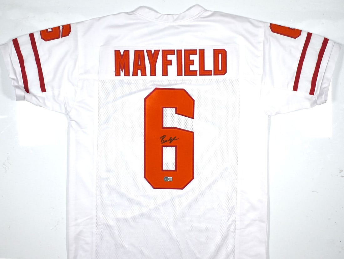 Signed Baker Mayfield White Football Jersey Beckett Hologram: Signed Baker Mayfield White Football Jersey Beckett Hologram Autographed white pro style football jersey featuring Baker Mayfield. The jersey is an original signed item and is associated with the Tamp