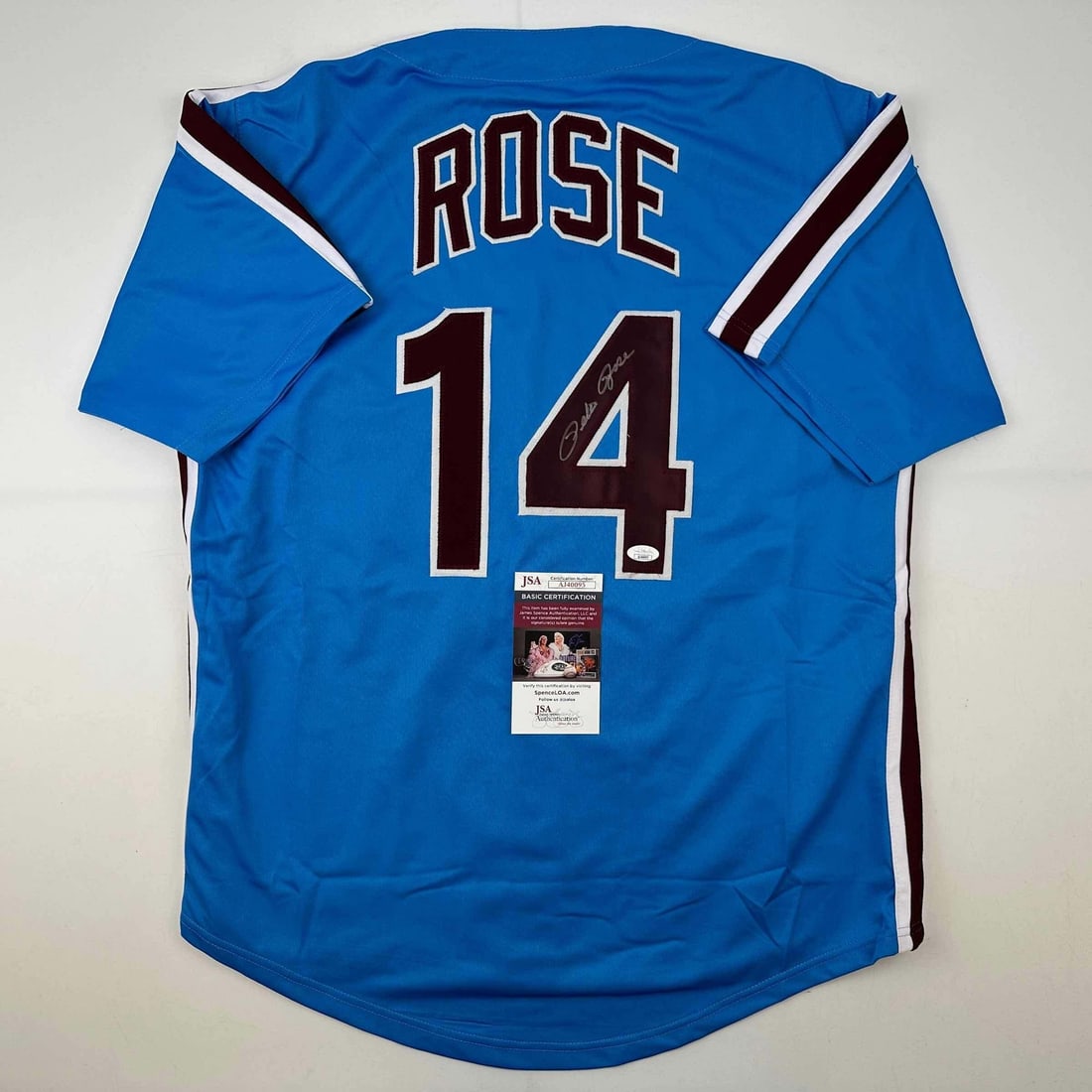 Pete Rose Autographed Phillies Retro Blue Jersey JSA Certified: Pete Rose Autographed Phillies Retro Blue Jersey JSA Certified Celebrate the legacy of baseball legend Pete Rose with this autographed Philadelphia Retro Blue Baseball Jersey. This authentic collectib