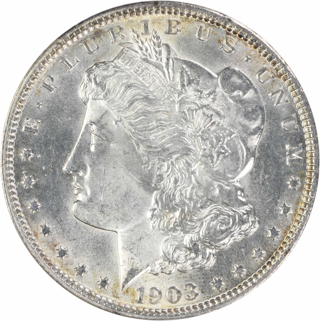 1903 Uncirculated Morgan Silver Dollar Philadelphia Uncertified MS63: 1903 Uncirculated Morgan Silver Dollar Philadelphia Uncertified MS63 1903 Morgan Silver Dollar in uncirculated condition, graded MS63. This United States coin has a denomination of $1 and features the