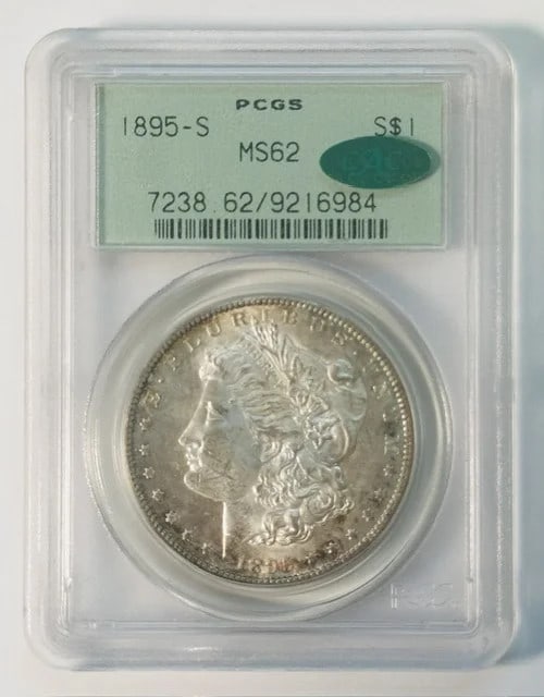 1895 San Francisco Morgan Silver Dollar PCGS MS62 CAC Holder: 1895 San Francisco Morgan Silver Dollar PCGS MS62 CAC Holder 1895-S Morgan Silver Dollar certified by PCGS and CAC, graded MS 62. This pre-owned silver dollar was minted in San Francisco, USA, and is 