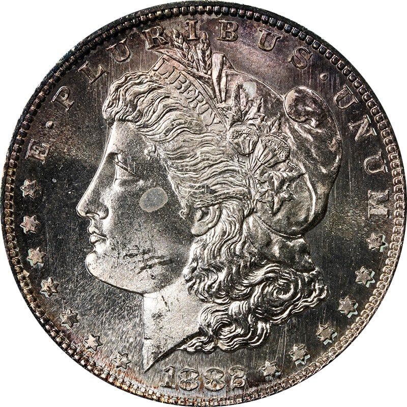 1882-S Morgan Dollar NGC MS64 Toning: 1882-S Morgan Dollar NGC MS64 Toning This 1882-S Morgan Silver Dollar is graded MS64 by NGC and features attractive toning. Struck in 90% silver, this uncirculated coin was minted in San Francisco and