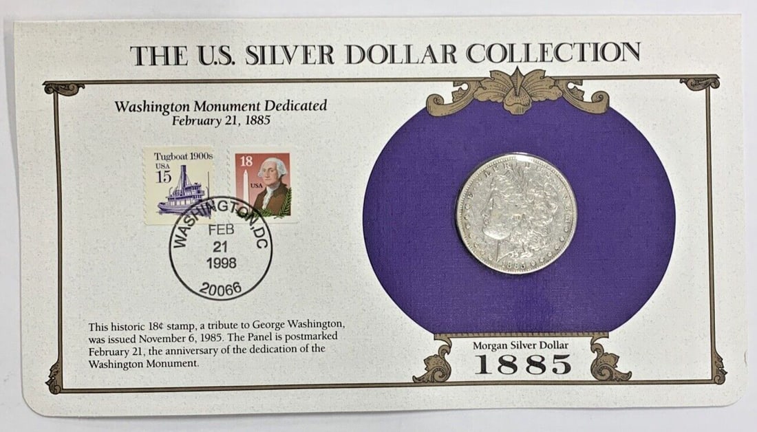 1885 Morgan Dollar Silver Coin with Commemorative Stamp Card: 1885 Morgan Dollar Silver Coin with Commemorative Stamp Card This collection features an 1885 Morgan Silver Dollar with a denomination of $1, minted in Philadelphia. The coin is circulated and ungrade