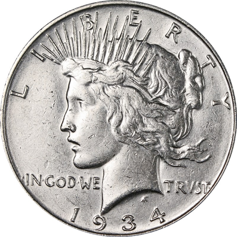 Silver 1934 Denver Mint Peace Dollar United States Coin: Silver 1934 Denver Mint Peace Dollar United States Coin This is a 1934-D Peace Dollar from the United States. Minted in Denver, it is composed of silver with a fineness of 0.9. The coin is circulated 