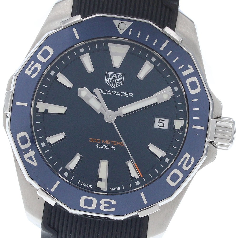 TAG Heuer Aquaracer Quartz Date Men's Wristwatch: TAG Heuer Aquaracer Quartz Date Men's Wristwatch This is a TAG HEUER Aquaracer Date Quartz men's wristwatch, model WAY111C.FT6155. Made in Switzerland, it features a classic design and reliable quartz