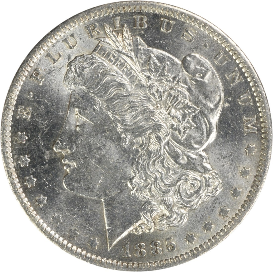 Uncirculated 1885 O Silver Morgan Dollar Brilliant Uncertified US Coin: Uncirculated 1885 O Silver Morgan Dollar Brilliant Uncertified US Coin This 1885-O Morgan Silver Dollar is an uncirculated coin from the United States. Struck at the New Orleans Mint, it is composed o