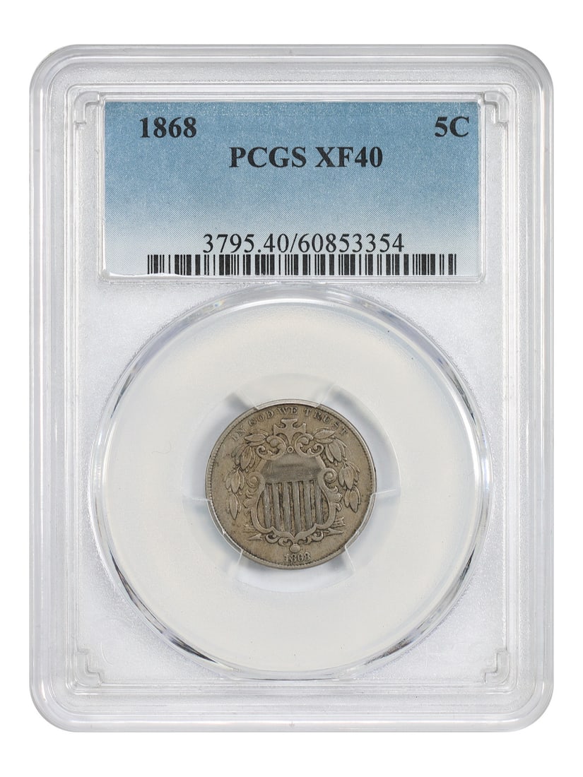 PCGS XF40 1868 5C Shield Nickel: PCGS XF40 1868 5C Shield Nickel An 1868 Shield Nickel certified by PCGS and graded XF40. This circulated coin is a 5C denomination from the Philadelphia mint, listed as pre-owned. Specifications Certi