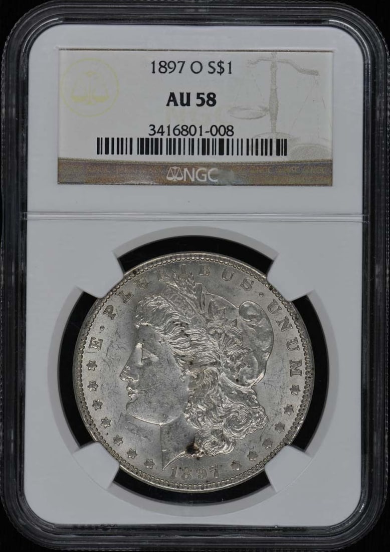 1897-O Morgan Dollar S$1 NGC AU58 Coin: 1897-O Morgan Dollar S$1 NGC AU58 Coin This 1897-O Morgan Dollar is a remarkable piece of numismatic history. Graded AU58 by NGC, it showcases the exquisite design that has made the Morgan Dollar a fa