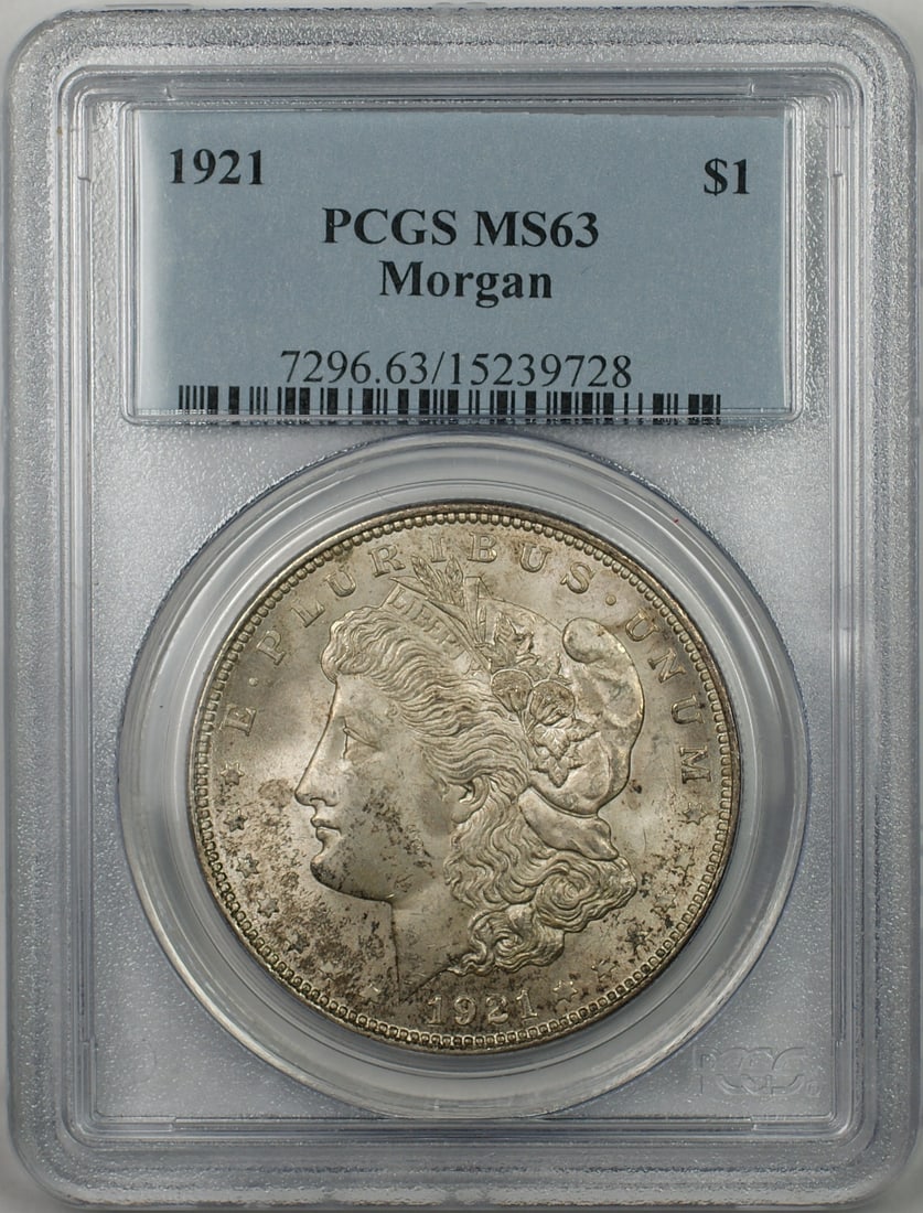 PCGS MS-63 1921 Philadelphia Morgan Dollar Silver Coin with Toning: PCGS MS-63 1921 Philadelphia Morgan Dollar Silver Coin with Toning This 1921 Morgan Silver Dollar is graded MS-63 by PCGS and features attractive toning. Struck at the Philadelphia Mint, this uncircul