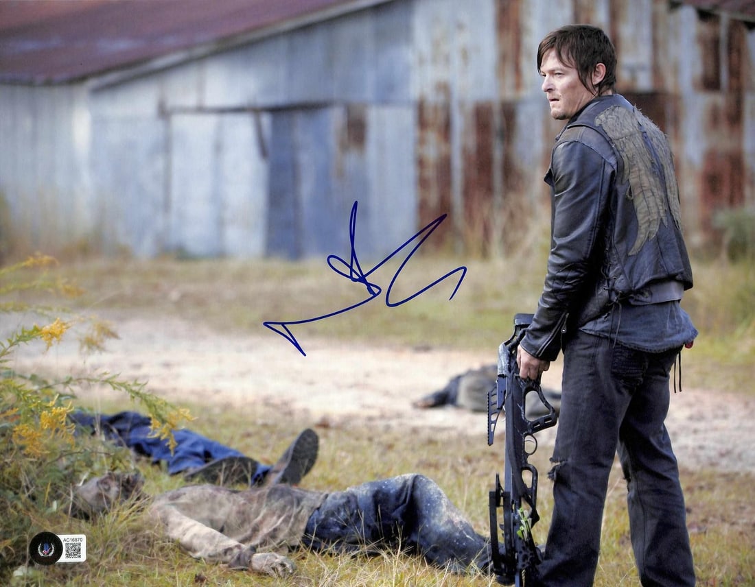 11x14 Norman Reedus signed Walking Dead photo Beckett LOA: 11x14 Norman Reedus signed Walking Dead photo Beckett LOA This 11x14 photograph features a hand-signed autograph by Norman Reedus, renowned for his role as Daryl Dixon on AMC's The Walking Dead. The s