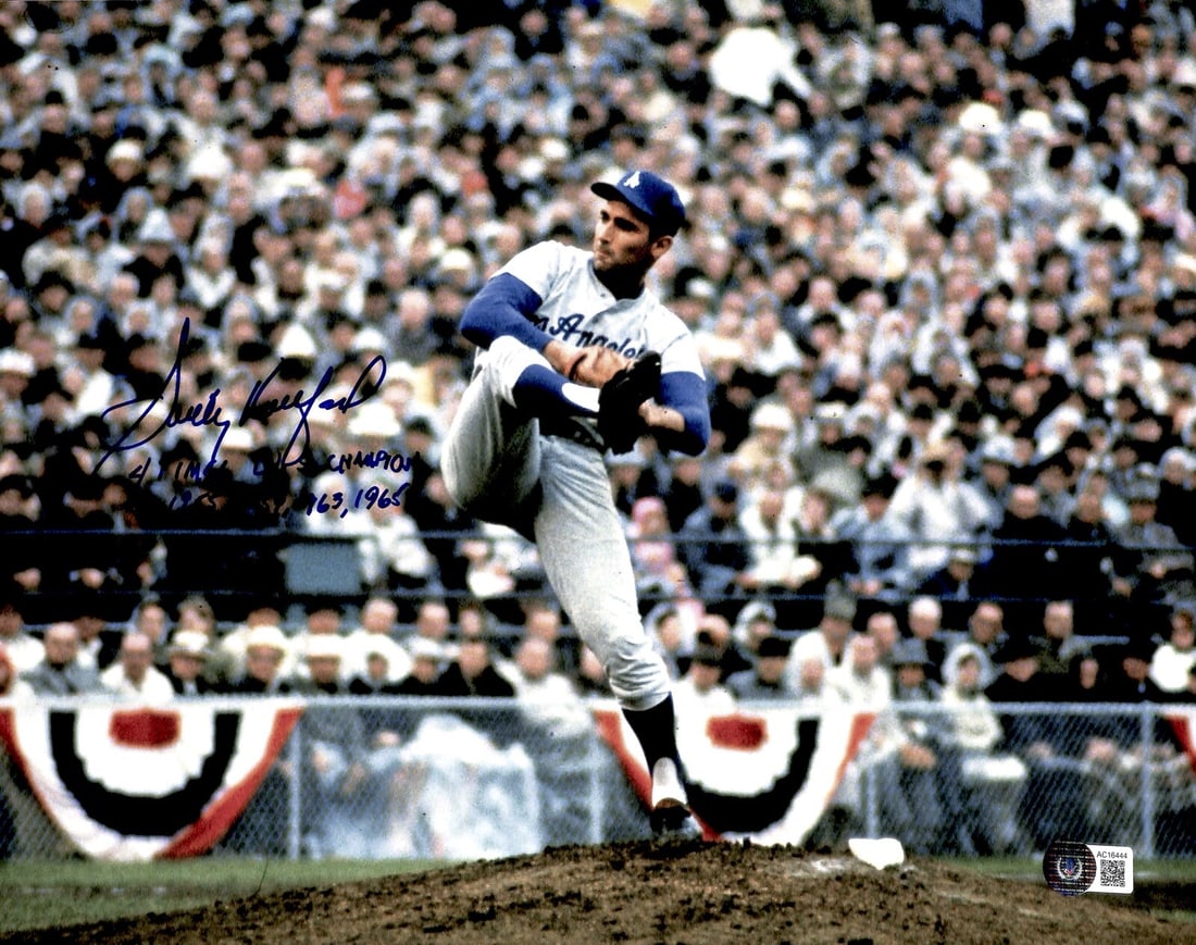 Sandy Koufax Signed 11x14 Photo with Inscription Beckett LOA: Sandy Koufax Signed 11x14 Photo with Inscription Beckett LOA This remarkable 11x14 color photograph features the legendary Sandy Koufax, a baseball icon from the LA Dodgers, who has signed it in blue 