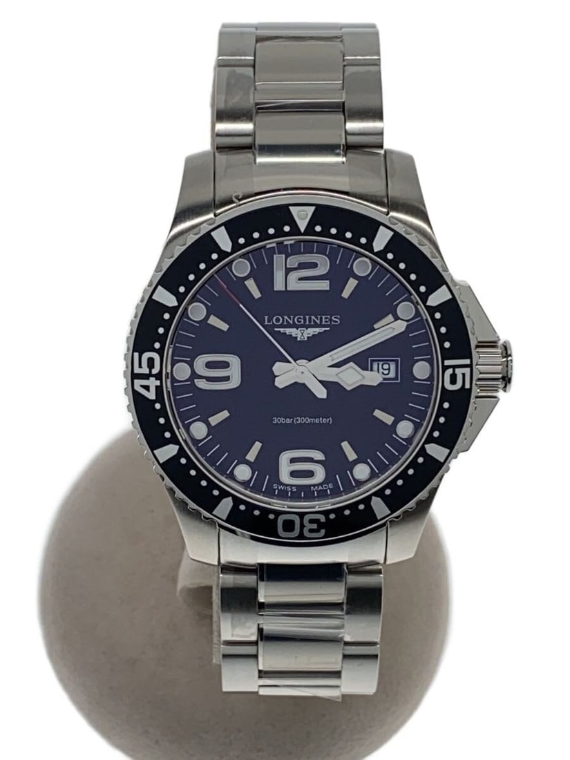 Longines Quartz HydroConquest Stainless Steel Black Dial Wristwatch: Longines Quartz HydroConquest Stainless Steel Black Dial Wristwatch This Longines HydroConquest Quartz L3.730.4 men's wristwatch features a stainless steel case and band with a black dial. Designed fo