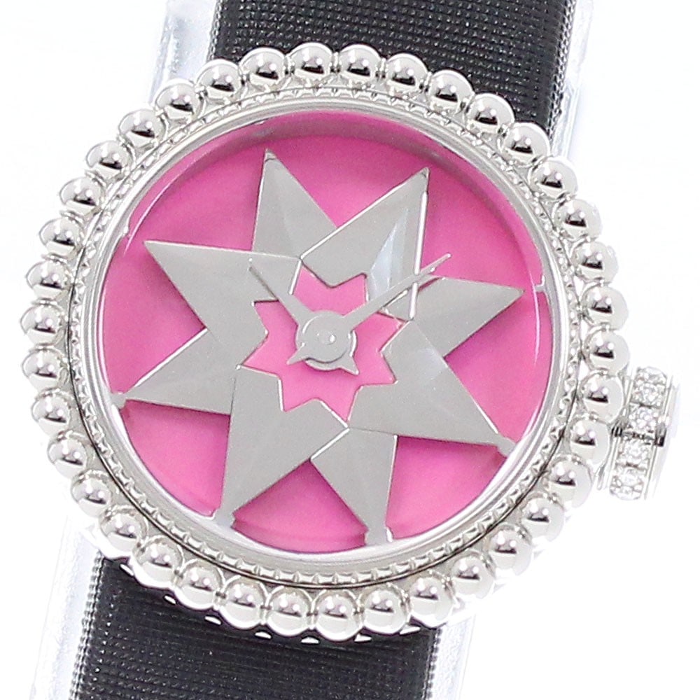 Dior La Mini D de Dior Quartz Pink Silver Ladies Watch CD040112: Dior La Mini D de Dior Quartz Pink Silver Ladies Watch CD040112 This Dior La Mini D de Dior women's wristwatch features a Swiss-made quartz movement and a refined design with a pink and silver dial. T