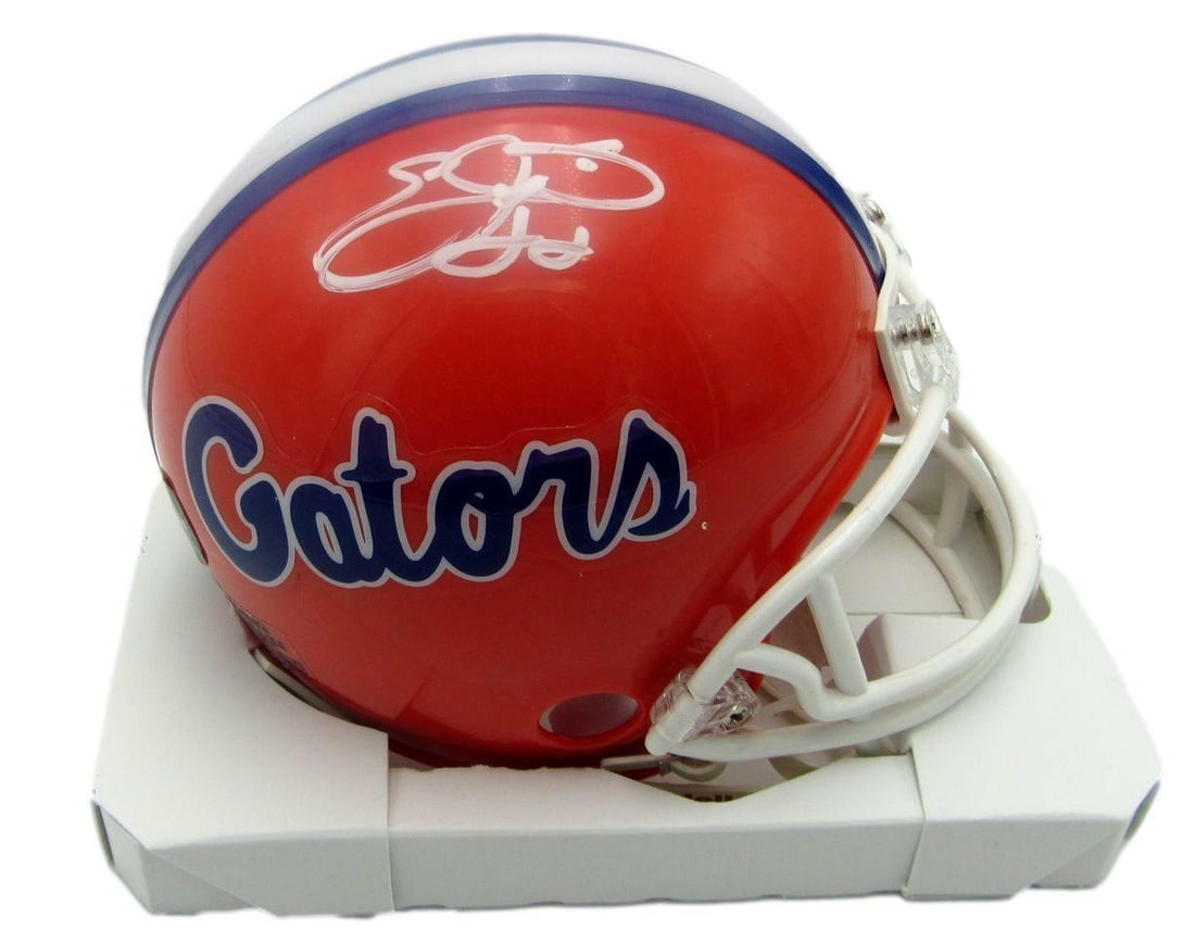 Emmitt Smith signed Florida Gators mini football helmet PROVA authenticated: Emmitt Smith signed Florida Gators mini football helmet PROVA authenticated This Emmitt Smith Hall of Fame autographed mini football helmet features the Florida Gators' orange design. The signature is
