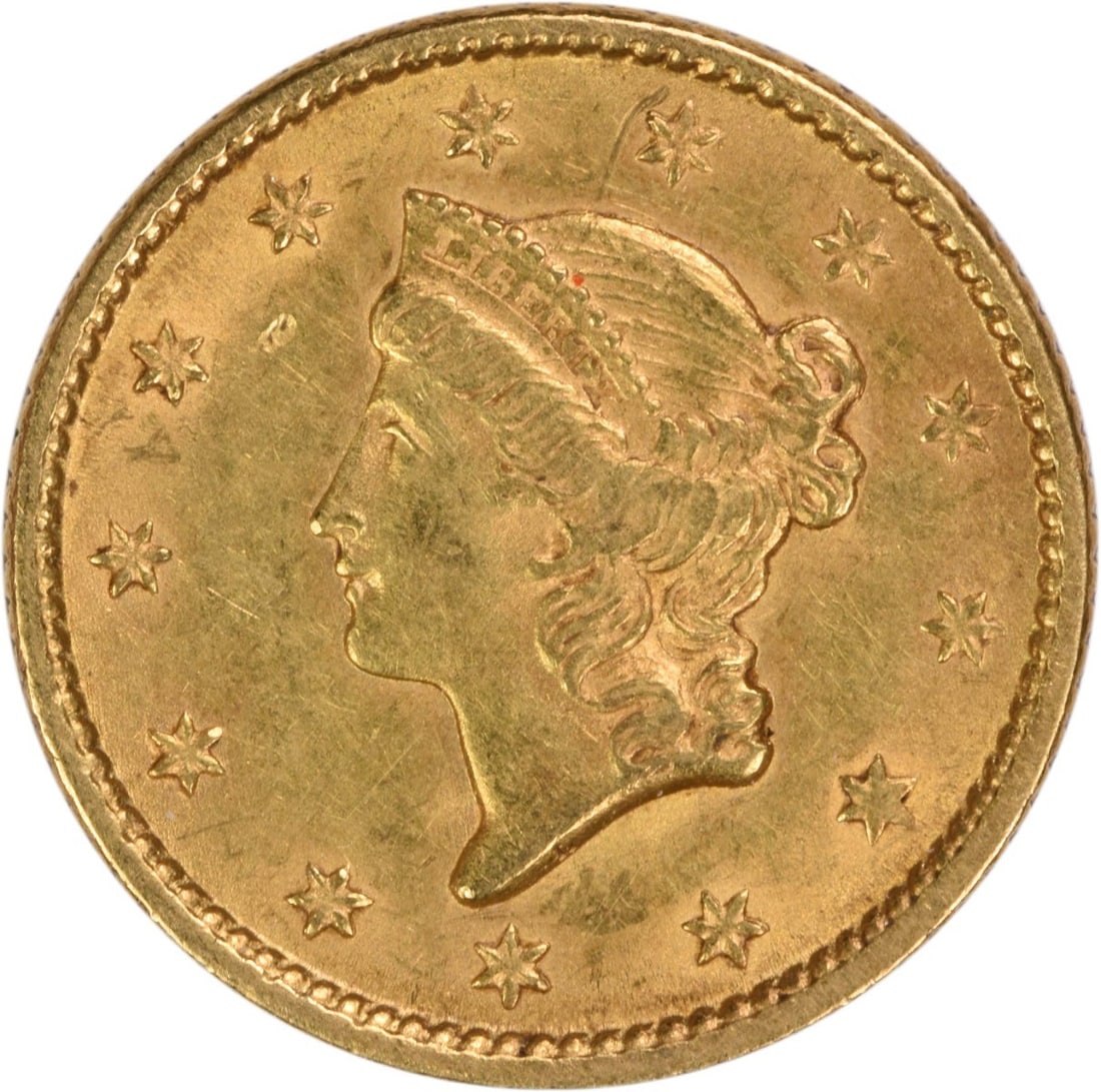 1852 United States Gold Dollar Type 1 AU Uncertified: 1852 United States Gold Dollar Type 1 AU Uncertified An 1852 $1 Gold Type 1 coin in AU circulated condition and uncertified. It was minted in Philadelphia and features a reeded edge. The coin was desi