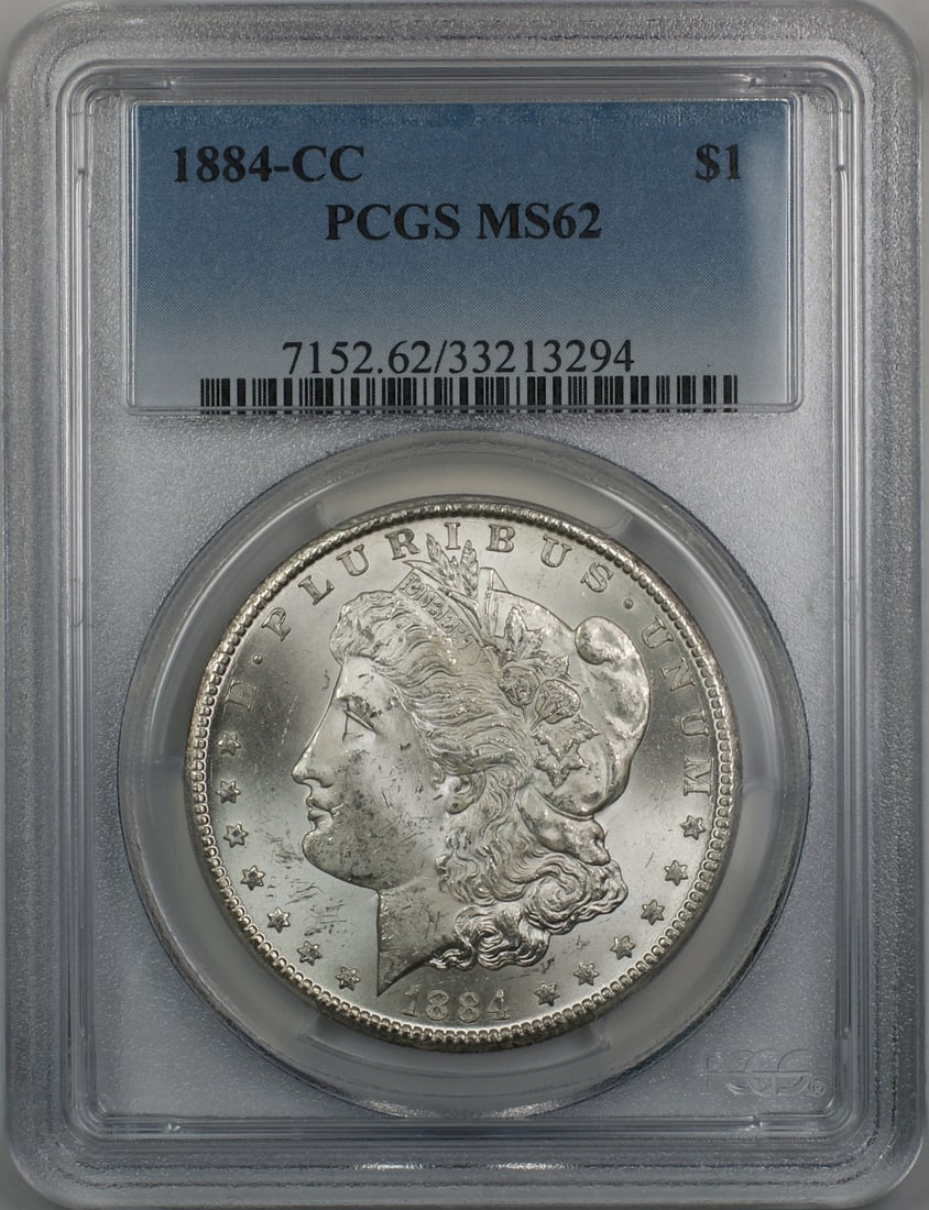 PCGS MS62 Carson City Morgan Silver Dollar 1884-CC: PCGS MS62 Carson City Morgan Silver Dollar 1884-CC This is an 1884-CC Morgan Silver Dollar graded MS 62 by PCGS. The coin is uncirculated and was minted in Carson City, featuring a silver composition 