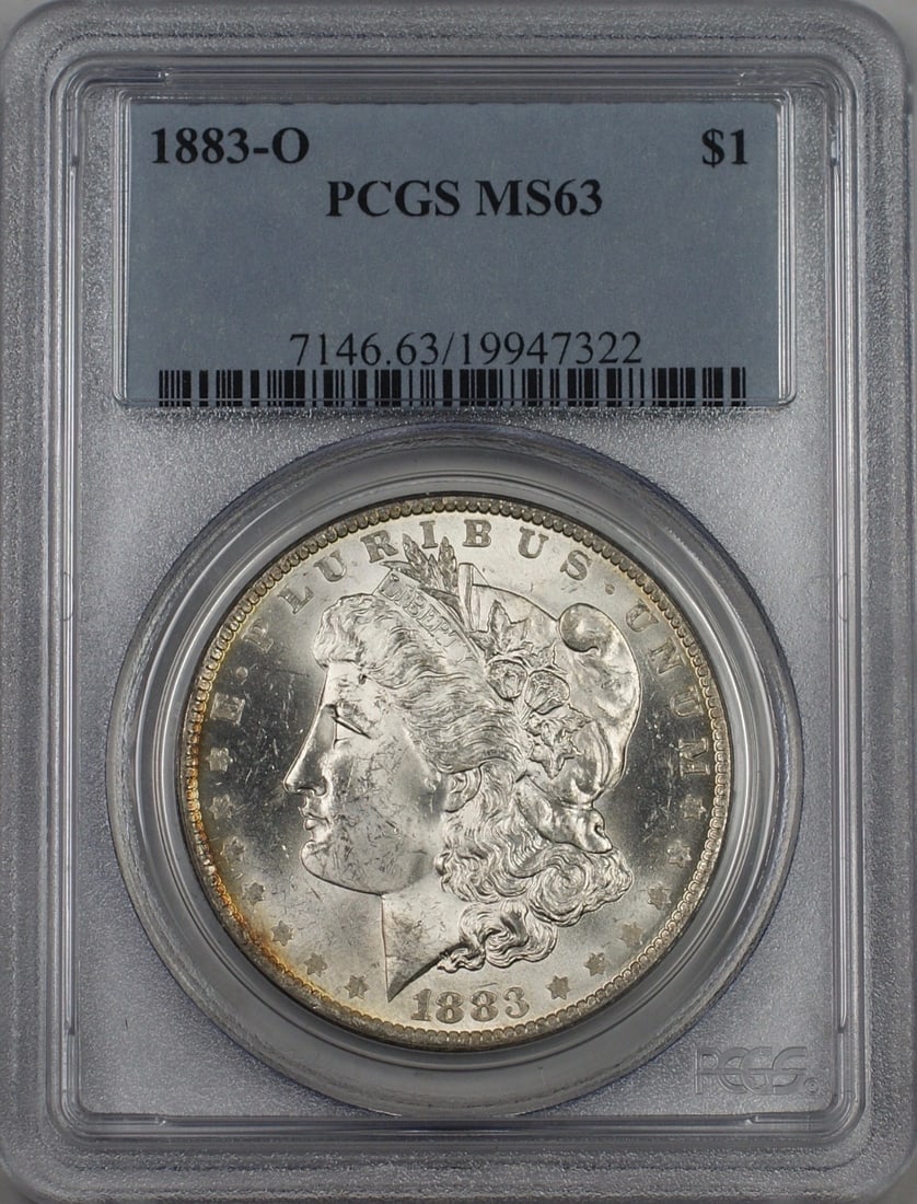 PCGS MS63 1883-O Morgan Silver Dollar $1: PCGS MS63 1883-O Morgan Silver Dollar $1 An 1883-O Morgan Silver Dollar $1 certified by PCGS and graded MS 63. This uncirculated coin is composed of silver with 0.9 fineness and was minted in New Orle
