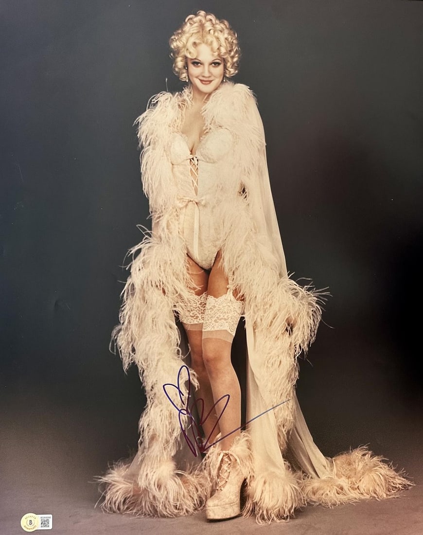 Beckett Authenticated Drew Barrymore Sugar Batman Forever 16x20 Signed Photo: Beckett Authenticated Drew Barrymore Sugar Batman Forever 16x20 Signed Photo This 16x20 photograph features Drew Barrymore as Sugar from the film Batman Forever. The photo is personally hand-signed by