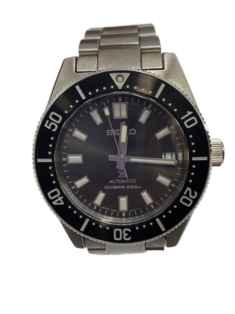 Seiko Prospex Black Stainless Steel Diver Wristwatch: Seiko Prospex Black Stainless Steel Diver Wristwatch This SEIKO PROSPEX DIVER men's wristwatch features a black dial and a durable stainless steel case. Made in Japan, it is designed for reliability a